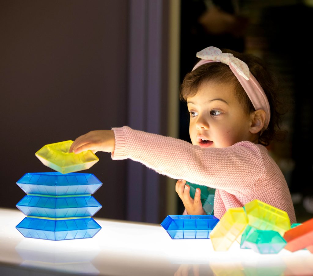 Playgroup child playing with blocks