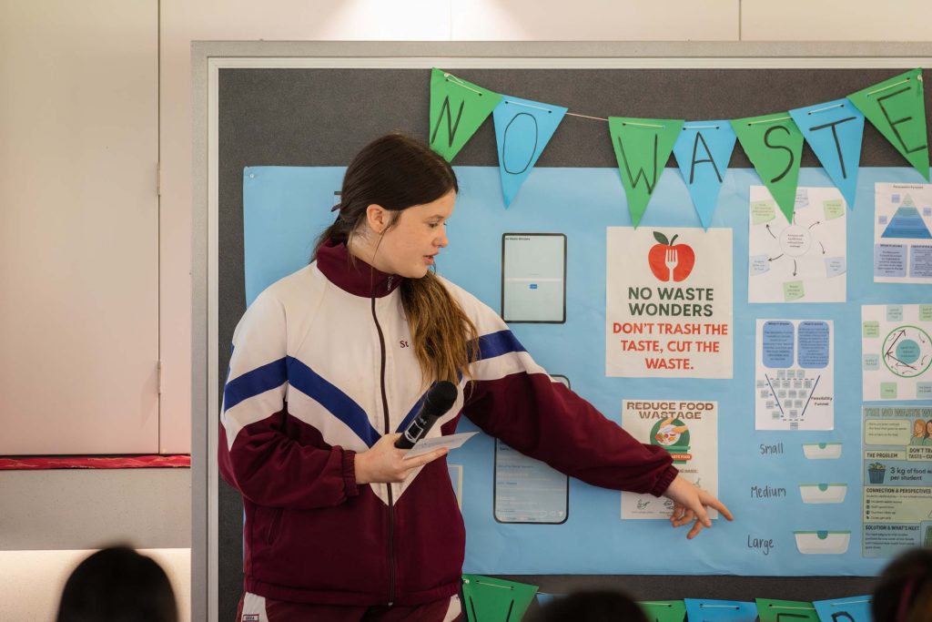 Students presenting their 'no waste' solution at the EDI Showcase